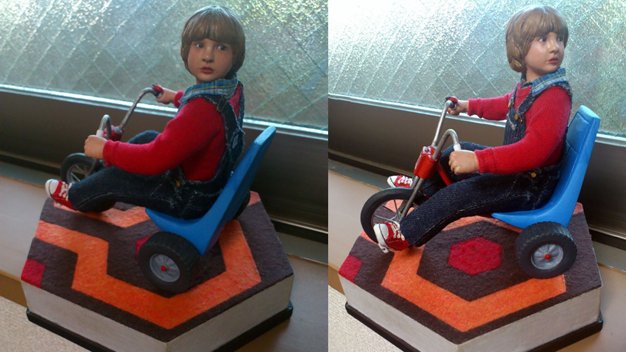 Two images side by side in full body shots of the completed miniature statue of Danny Torrance in various side views on base