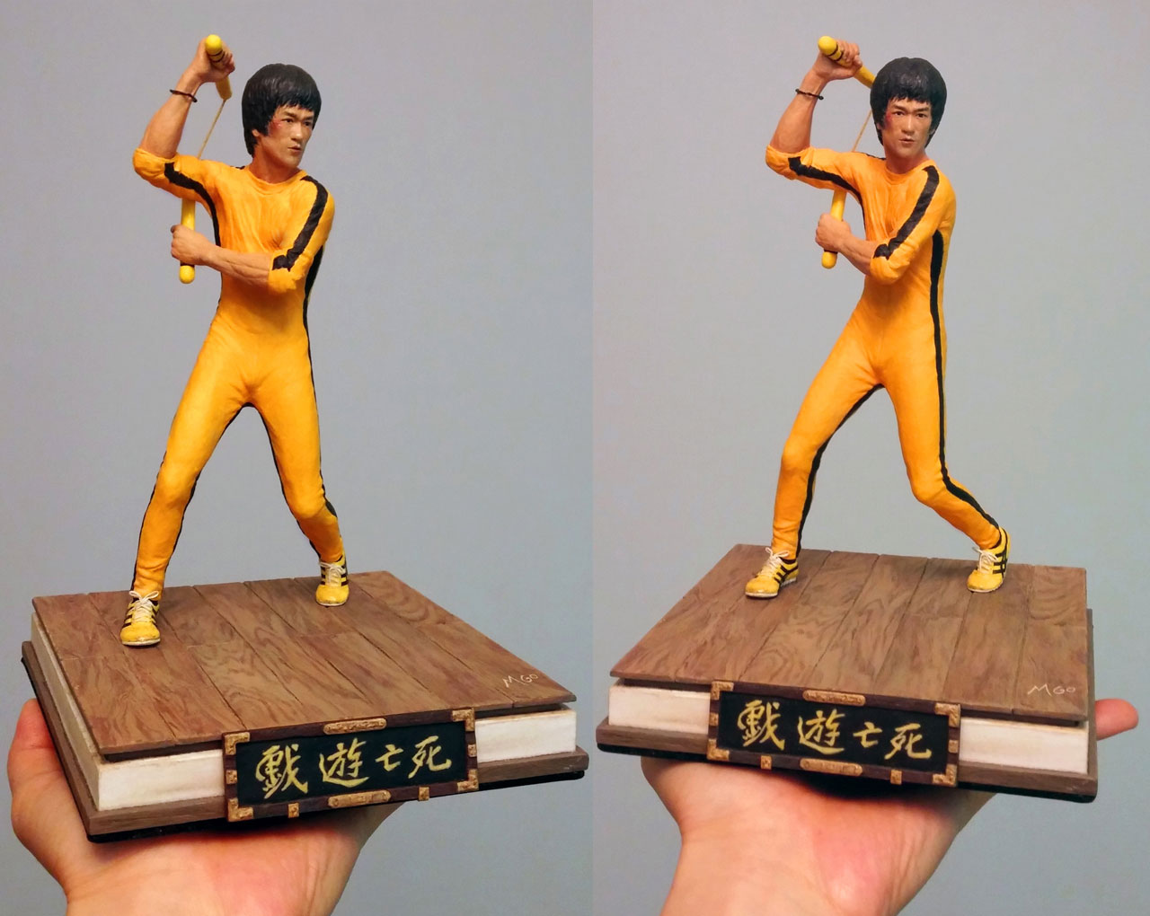 Two full body images of the completed miniature statue Hai Tien of Game of Death with nunchaku and base