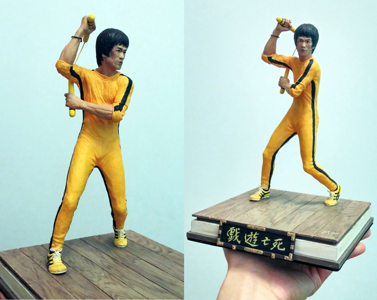 Two full body images of the completed miniature statue Hai Tien of Game of Death with nunchaku and base