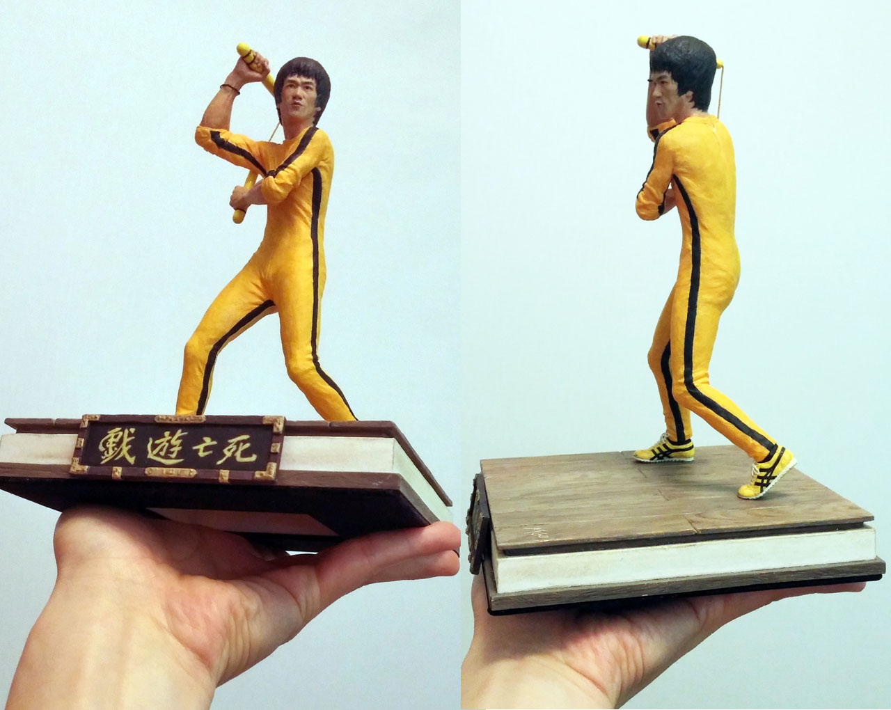 Two full body images of the completed miniature statue Hai Tien of Game of Death with nunchaku and base