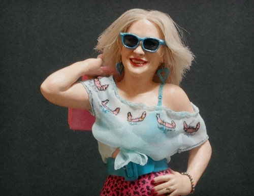 Oscar Academy award winner Patricia Arquette as Alabama Worley in the Tony Scott classic, True Romance with blue sunglasses and carrying pink bag over shoulder statue by Marten Go aka MGO